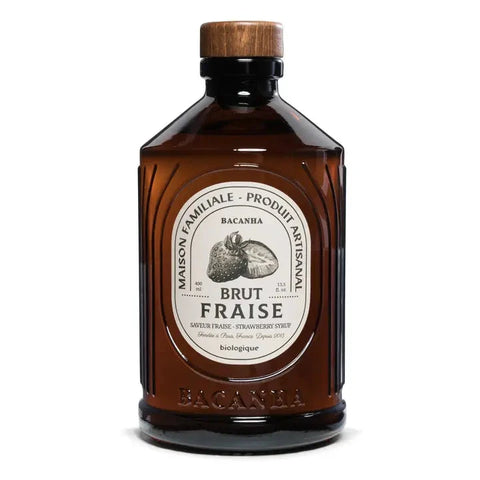 Brown bottle with a wooden cap labeled 'Brut Fraise' on a white background