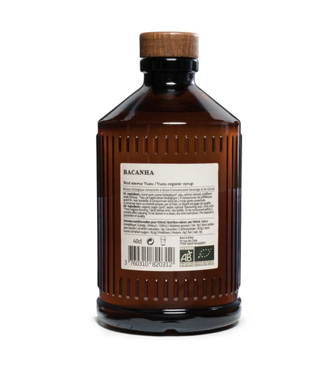 Brown bottle with wooden cap on a white background