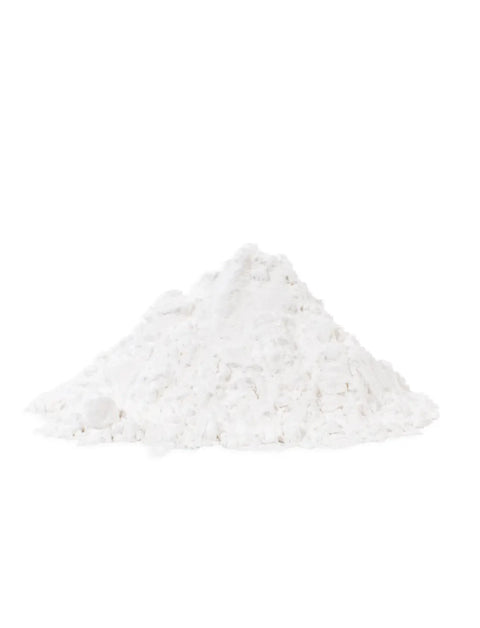 A small mound of white powder centered on a plain white background.