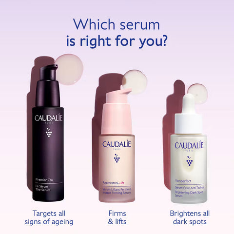 Three Caudalie Paris skincare serums displayed side by side on a pale lavender background with the headline 'Which serum is right for you?'. The left bottle is black and labeled Premier Cru, the middle bottle is pale pink and labeled Reversing-Lift, and the right bottle is white with a dropper and labeled Vigrject.