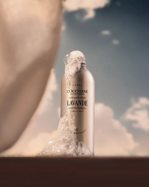 L'Occitane Lavande bubble bath bottle with a blurred background