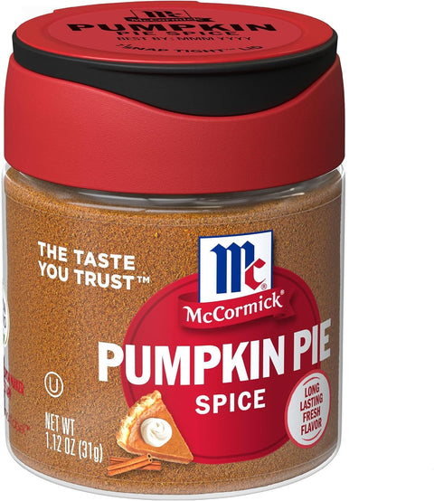 A jar of McCormick Pumpkin Pie Spice on a plain white background. The product features a red lid with a black center, a clear glass jar showing the brown-orange ground spice inside, and a label with the McCormick logo and a slice of pumpkin pie.