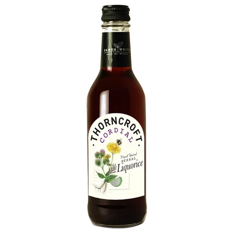 A bottle of Thorncroft Cordial Herbal Liquorice syrup on a plain white background. The glass bottle shows the dark amber liquid inside, featuring a white label with illustrations of herbs and a bee, and a black cap with the brand name 'JAMES WHITE' visible near the neck.